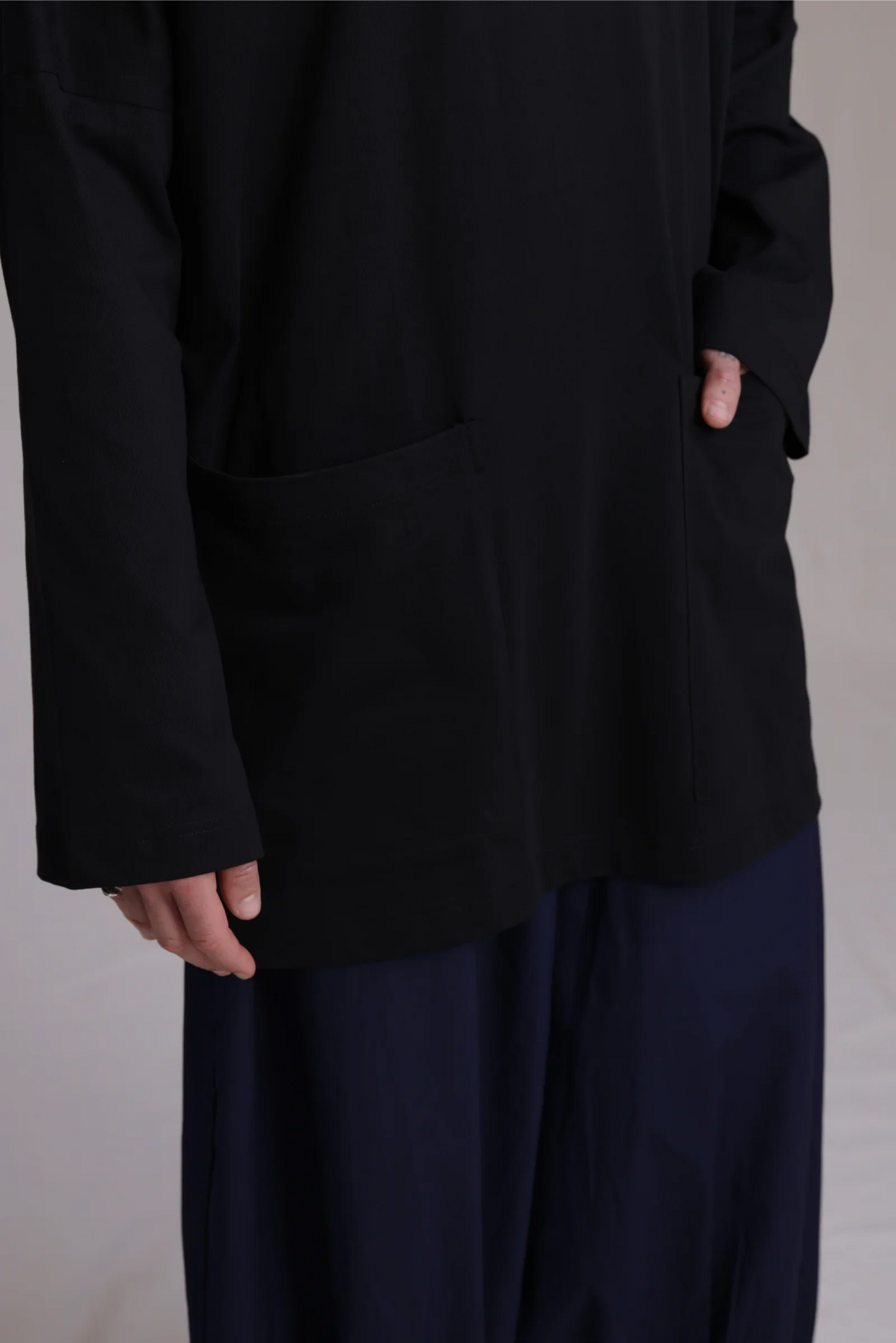 ALBI Tsuki Shirt, an oversized long sleeve cotton jersey tee with patch pockets and side slits