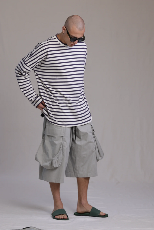 ALBI Yu Pants, oversized cotton cargo shorts with large utility pockets