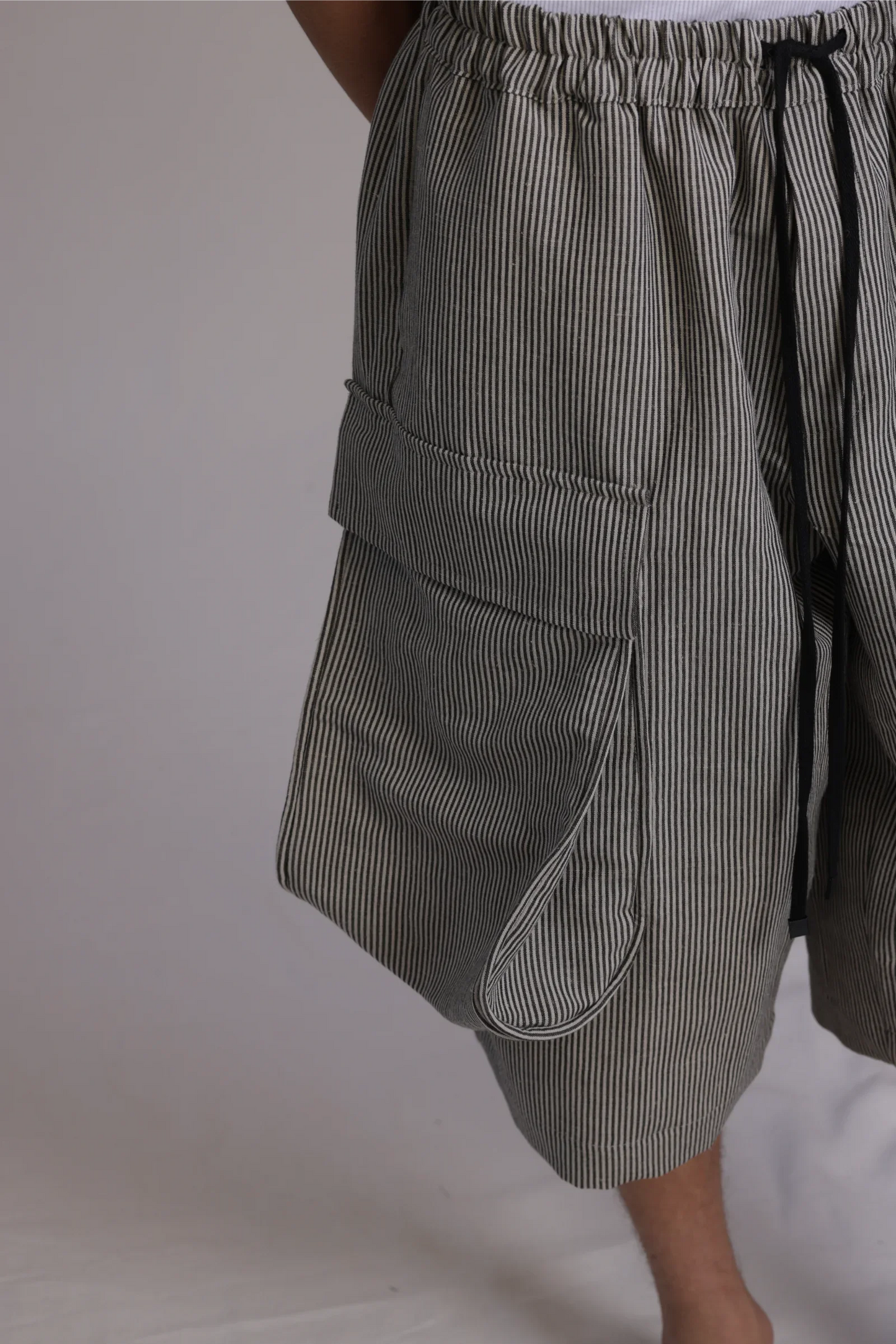 ALBI Yu Pants, oversized cotton cargo shorts with large utility pockets