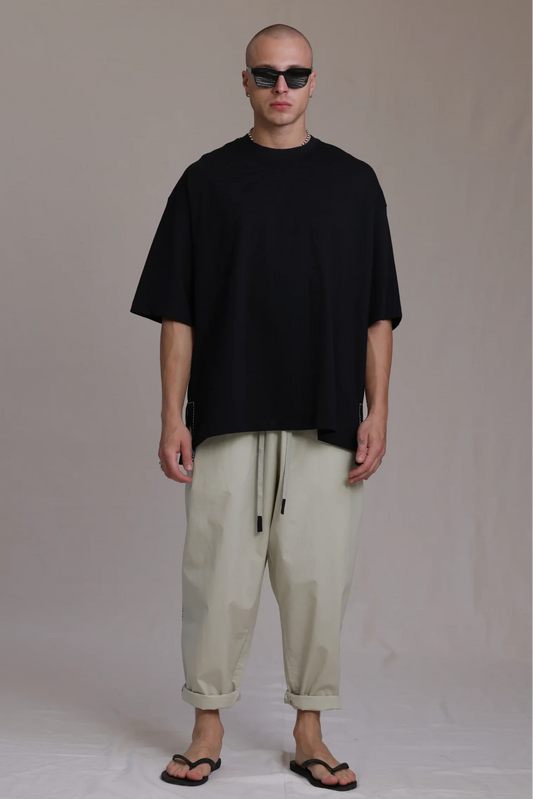 ALBI Sapan Shirt, an oversized short sleeve cotton jersey tee with hand-stitched side slits