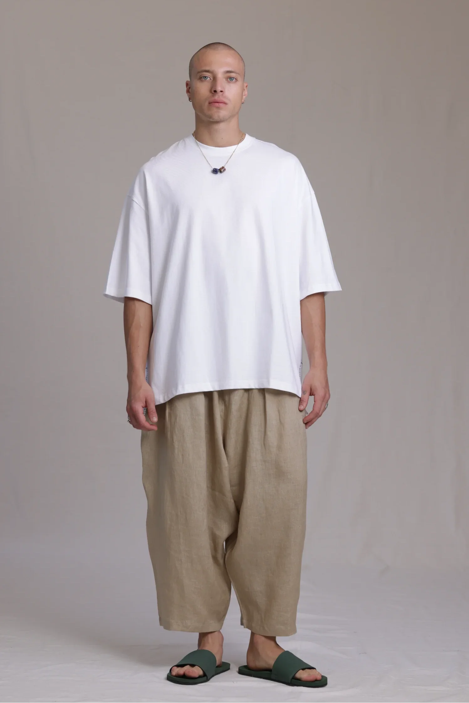 ALBI Sapan Shirt, an oversized short sleeve cotton jersey tee with hand-stitched side slits