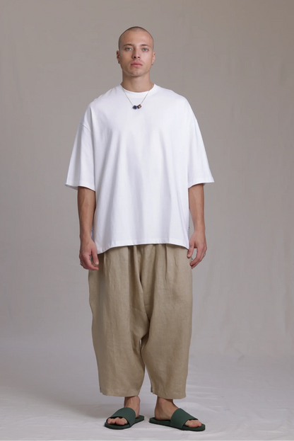 ALBI Sapan Shirt, an oversized short sleeve cotton jersey tee with hand-stitched side slits