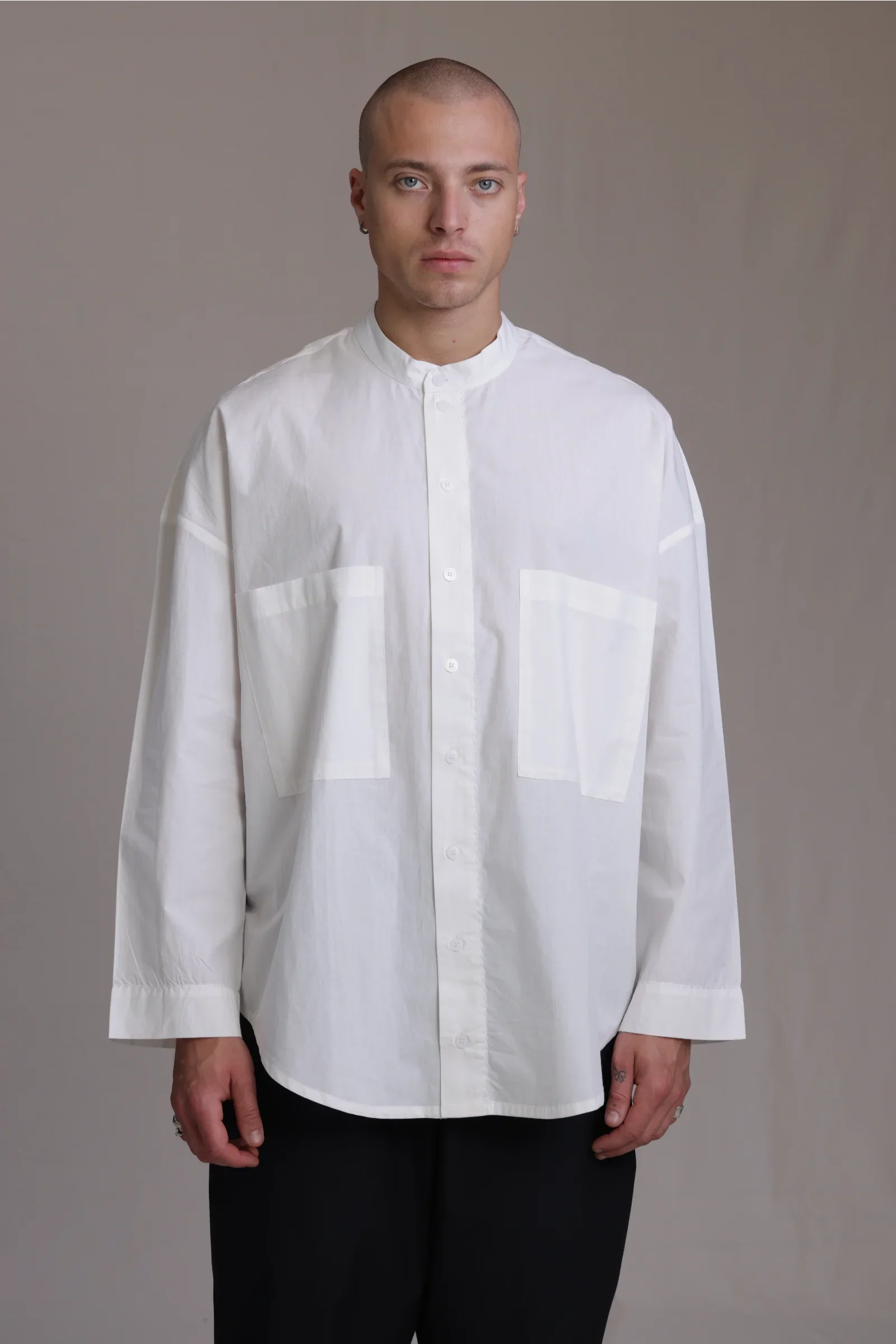 ALBI Rin Shirt, an oversized cotton poplin band collar shirt with tonal hand-stitched detailing
