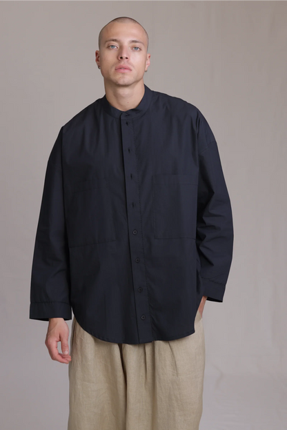 ALBI Rin Shirt, an oversized cotton poplin band collar shirt with tonal hand-stitched detailing