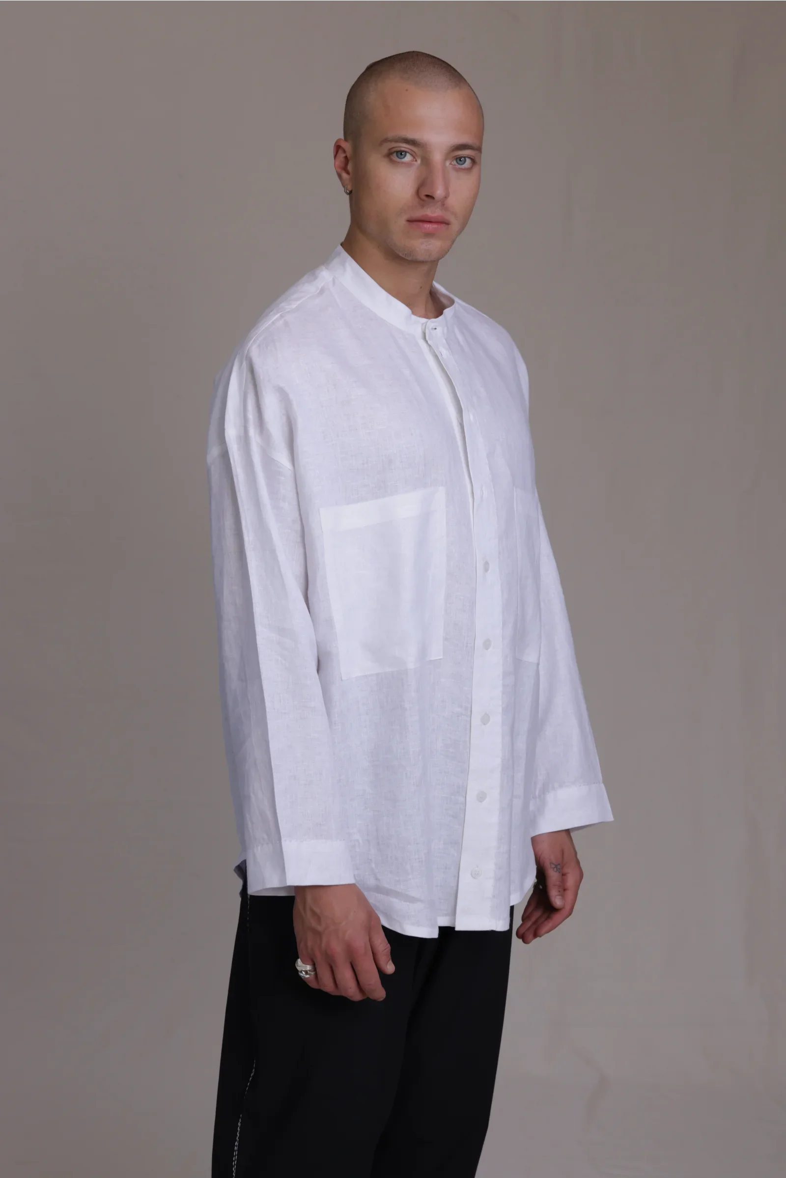 ALBI Hikari Shirt, an oversized linen band collar shirt with tonal hand-stitched detailing