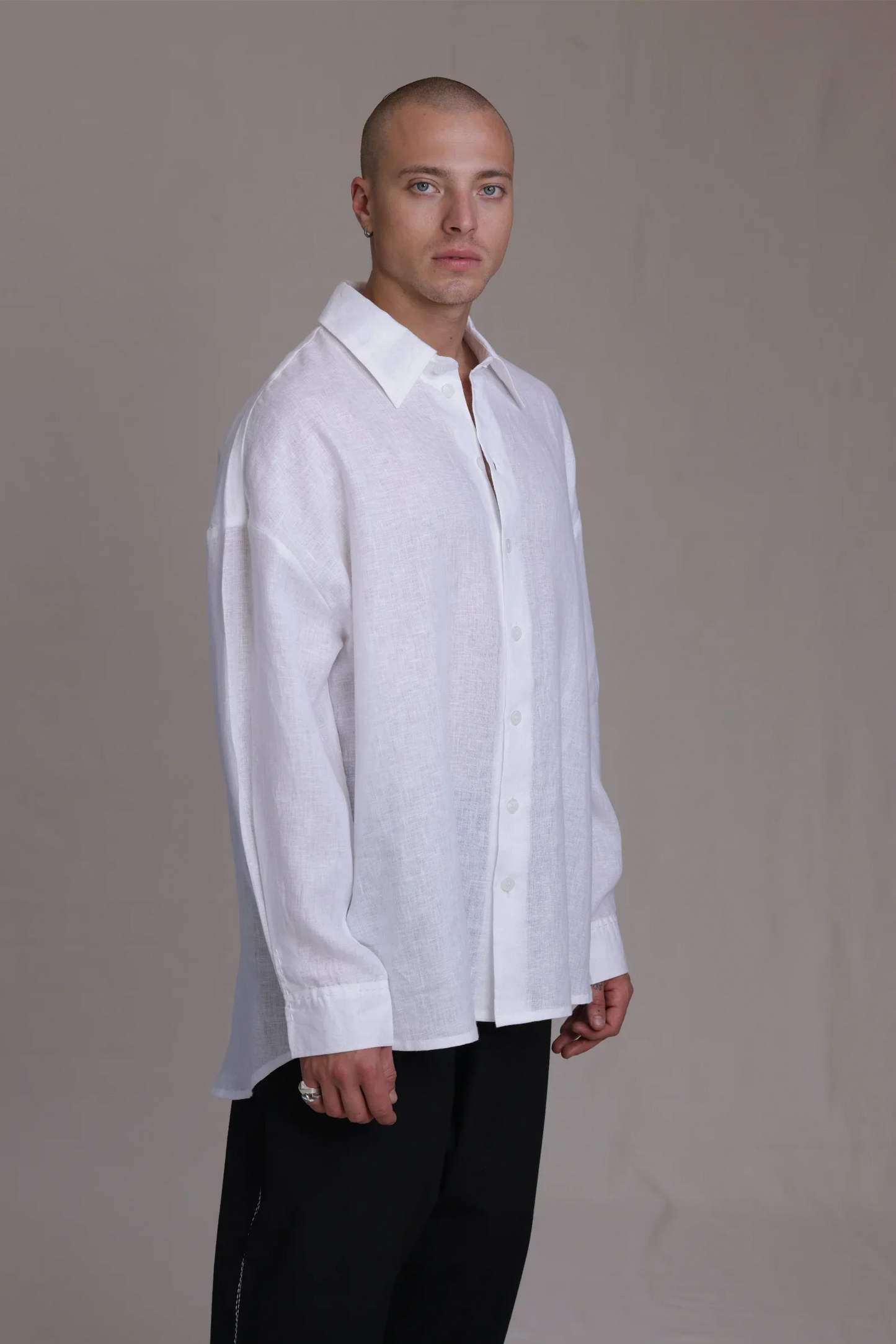 ALBI Toki Shirt, an oversized linen shirt with a classic collar and tonal hand-stitched detailing