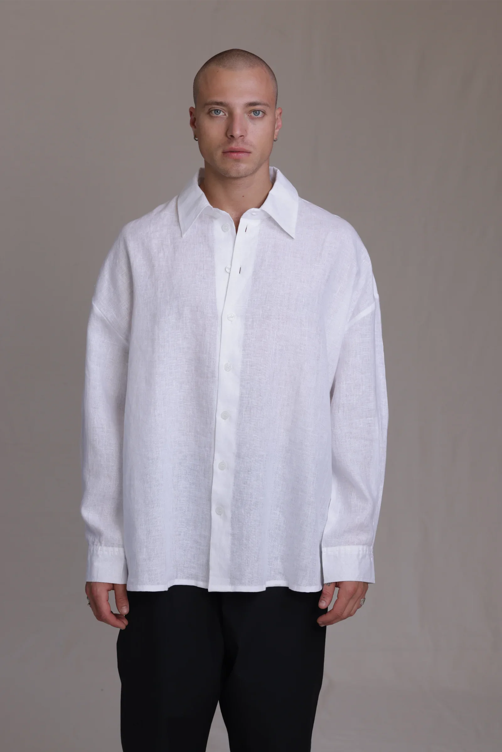 ALBI Toki Shirt, an oversized linen shirt with a classic collar and tonal hand-stitched detailing