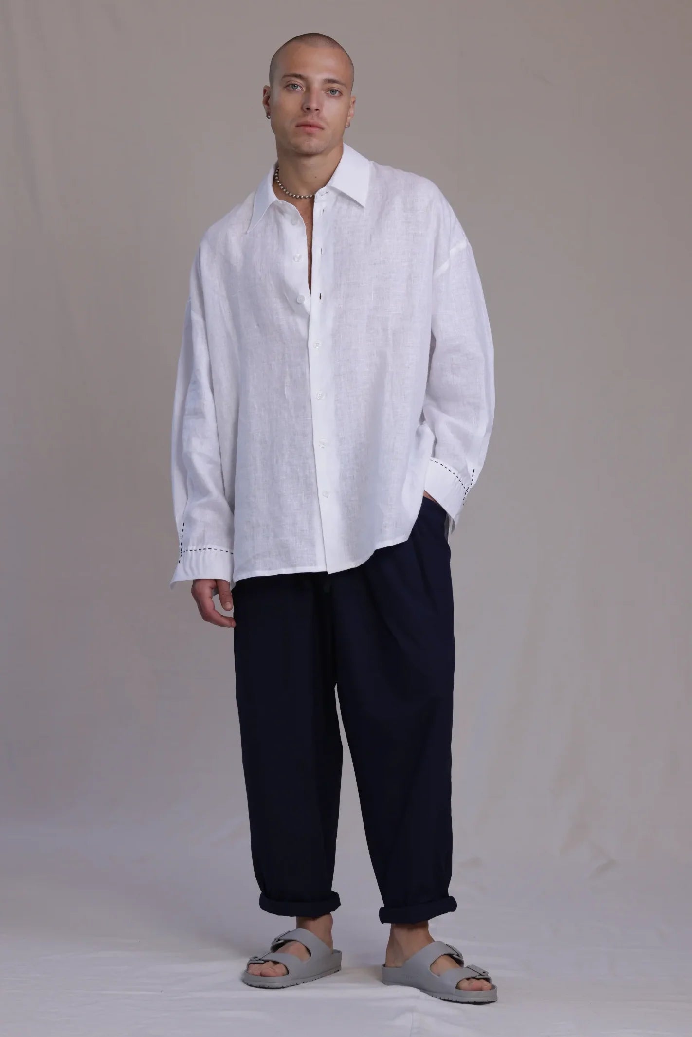 ALBI Kaze Shirt, an oversized linen shirt with a classic collar and bold hand-stitched detailing