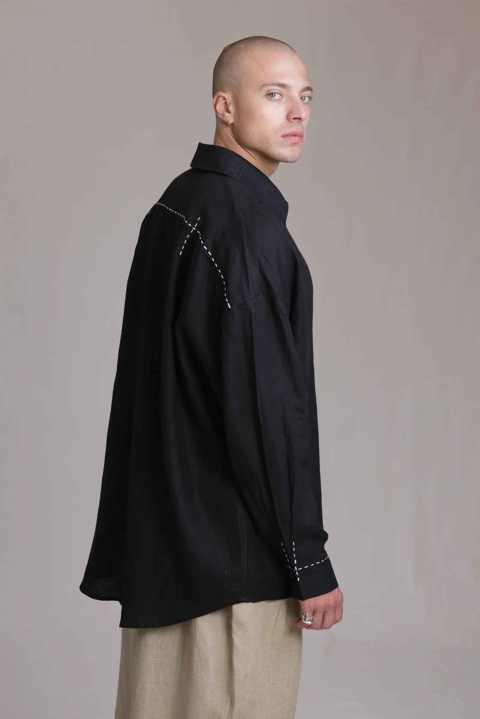 ALBI Kaze Shirt, an oversized linen shirt with a classic collar and bold hand-stitched detailing