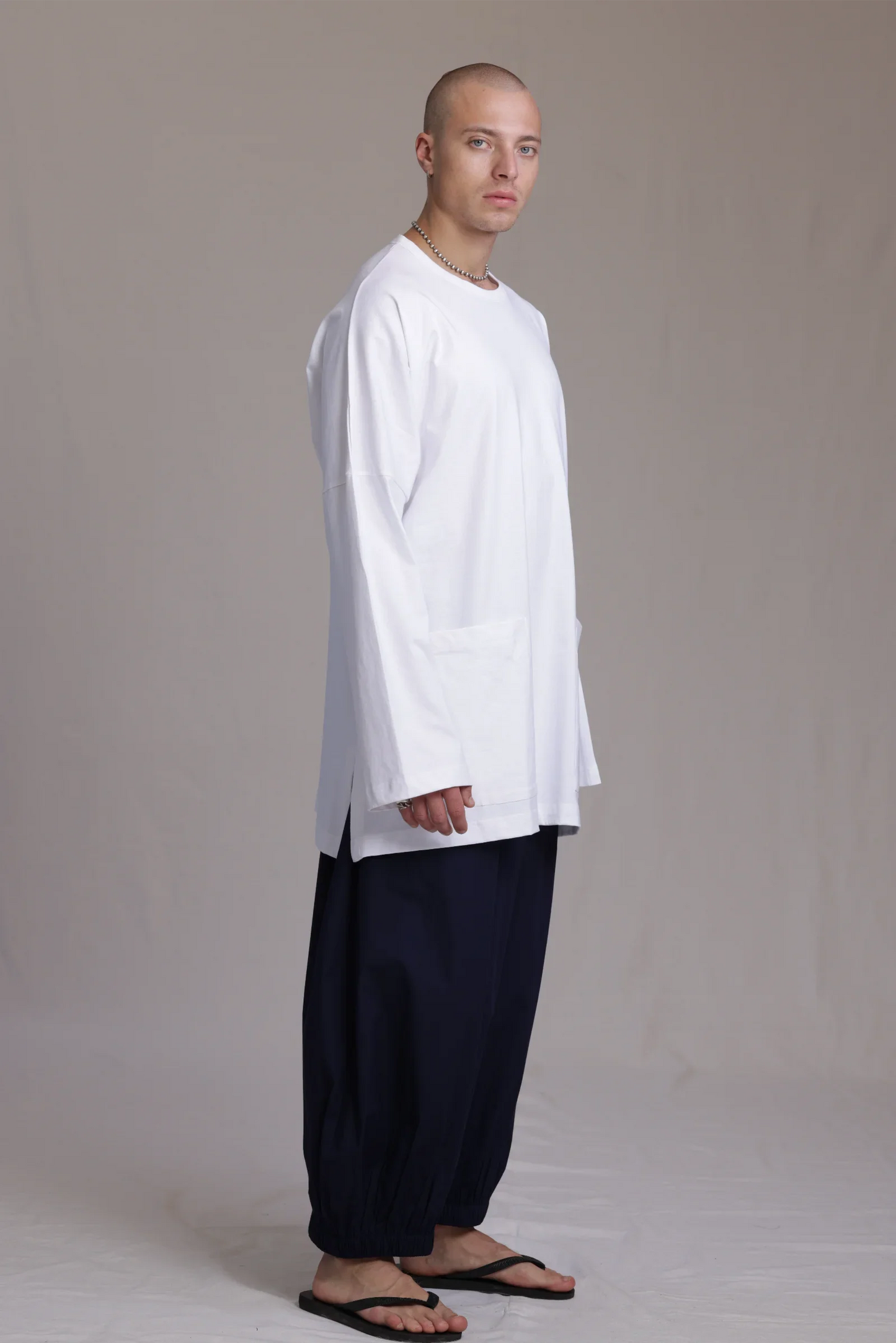 ALBI Tsuki Shirt, an oversized long sleeve cotton jersey tee with patch pockets and side slits