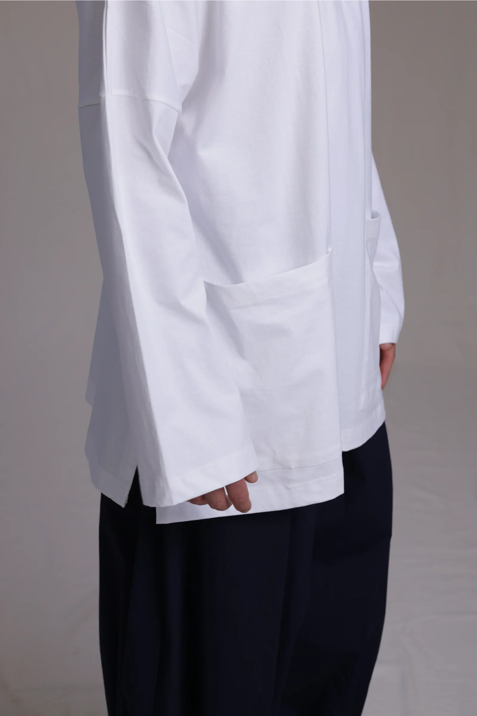 ALBI Tsuki Shirt, an oversized long sleeve cotton jersey tee with patch pockets and side slits