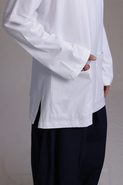 ALBI Tsuki Shirt, an oversized long sleeve cotton jersey tee with patch pockets and side slits