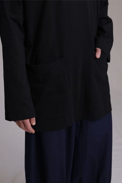 ALBI Tsuki Shirt, an oversized long sleeve cotton jersey tee with patch pockets and side slits