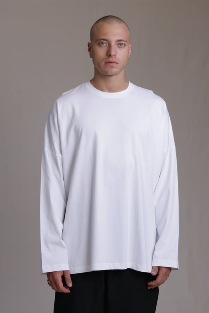 ALBI Michi Shirt, an oversized long sleeve cotton jersey tee with hand-stitched side slits