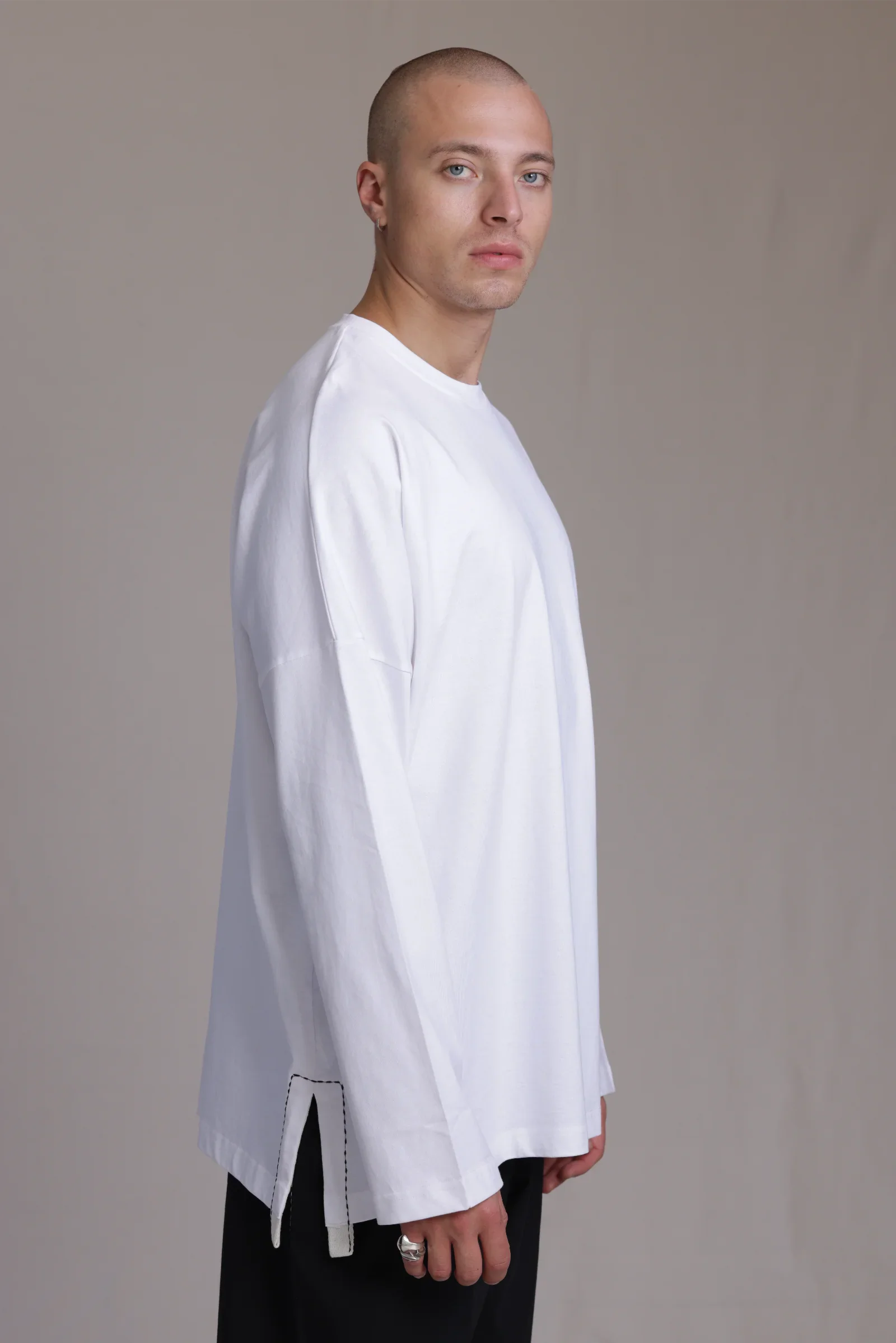 ALBI Michi Shirt, an oversized long sleeve cotton jersey tee with hand-stitched side slits