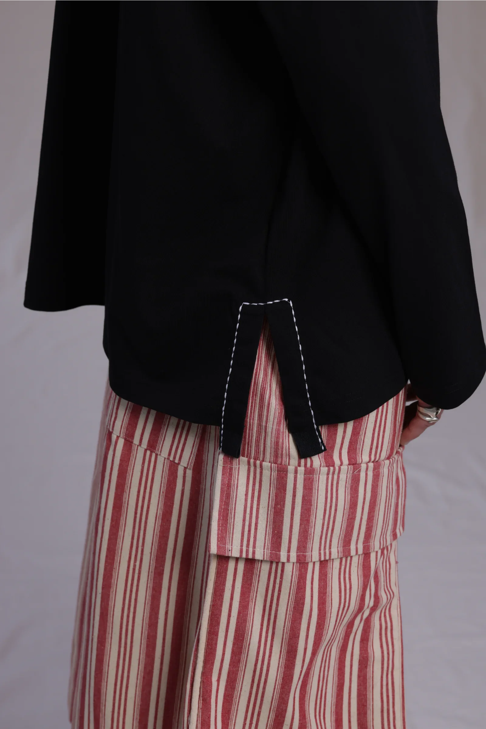 ALBI Michi Shirt, an oversized long sleeve cotton jersey tee with hand-stitched side slits