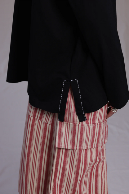 ALBI Michi Shirt, an oversized long sleeve cotton jersey tee with hand-stitched side slits