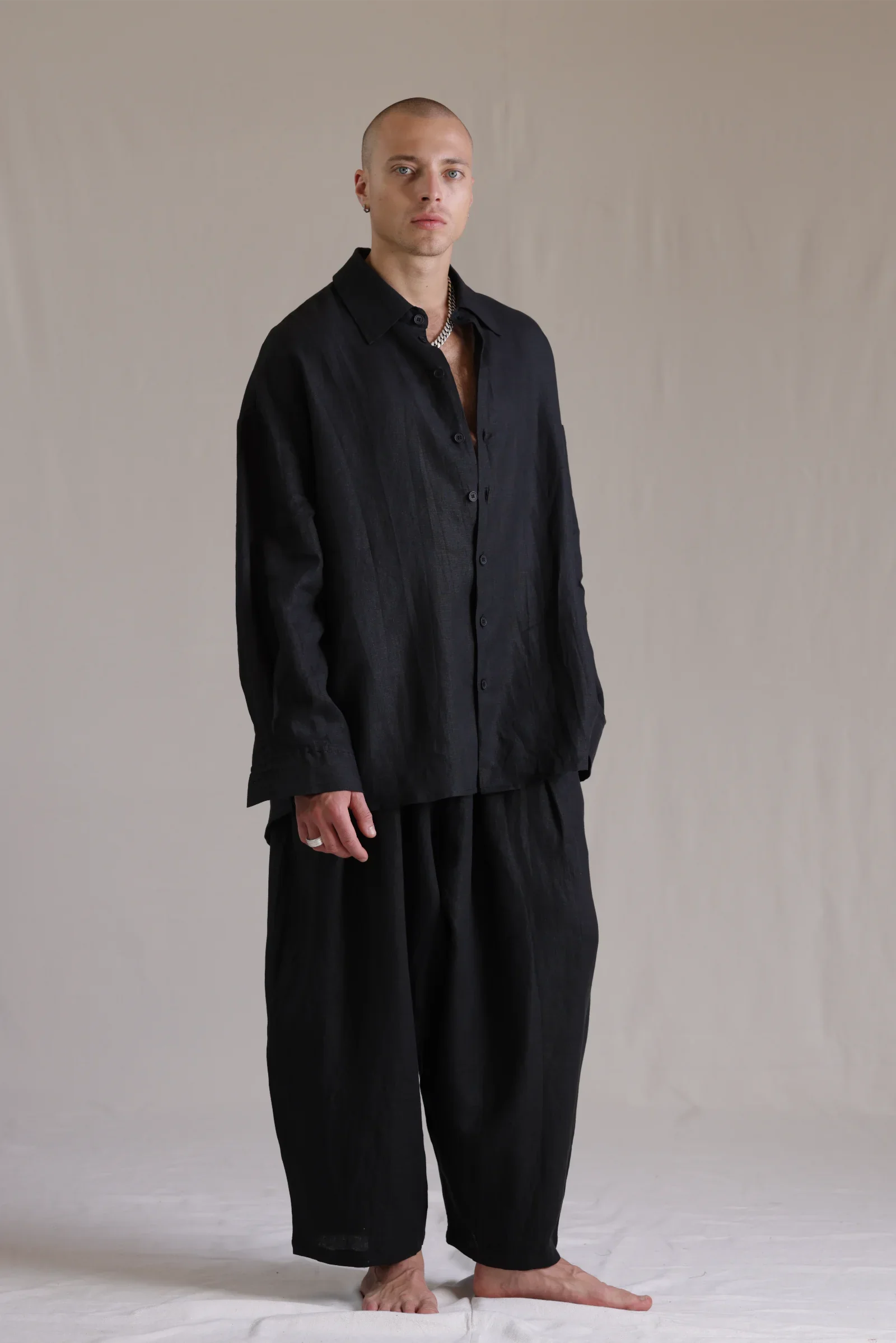 ALBI Toki Shirt, an oversized linen shirt with a classic collar and tonal hand-stitched detailing